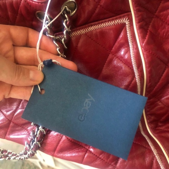 Very large East West Chanel red handbag. Great preowned condition. - Picture 11 of 13